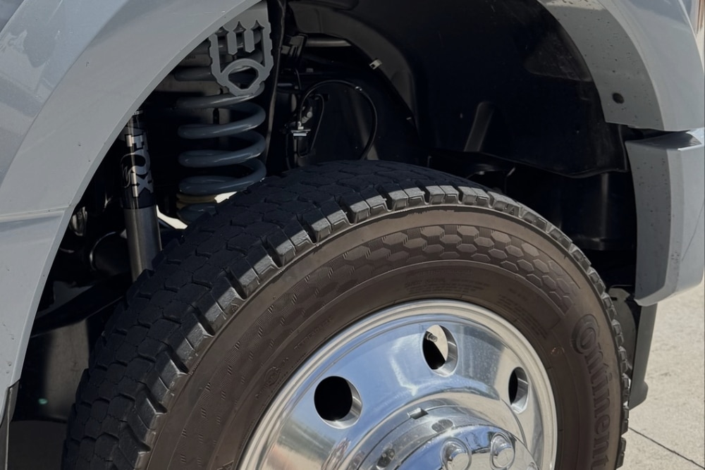Suspension Repair in St. Cloud, FL At FloState Auto Diesel Repair. Close-up view of a vehicle suspension in auto repair shop